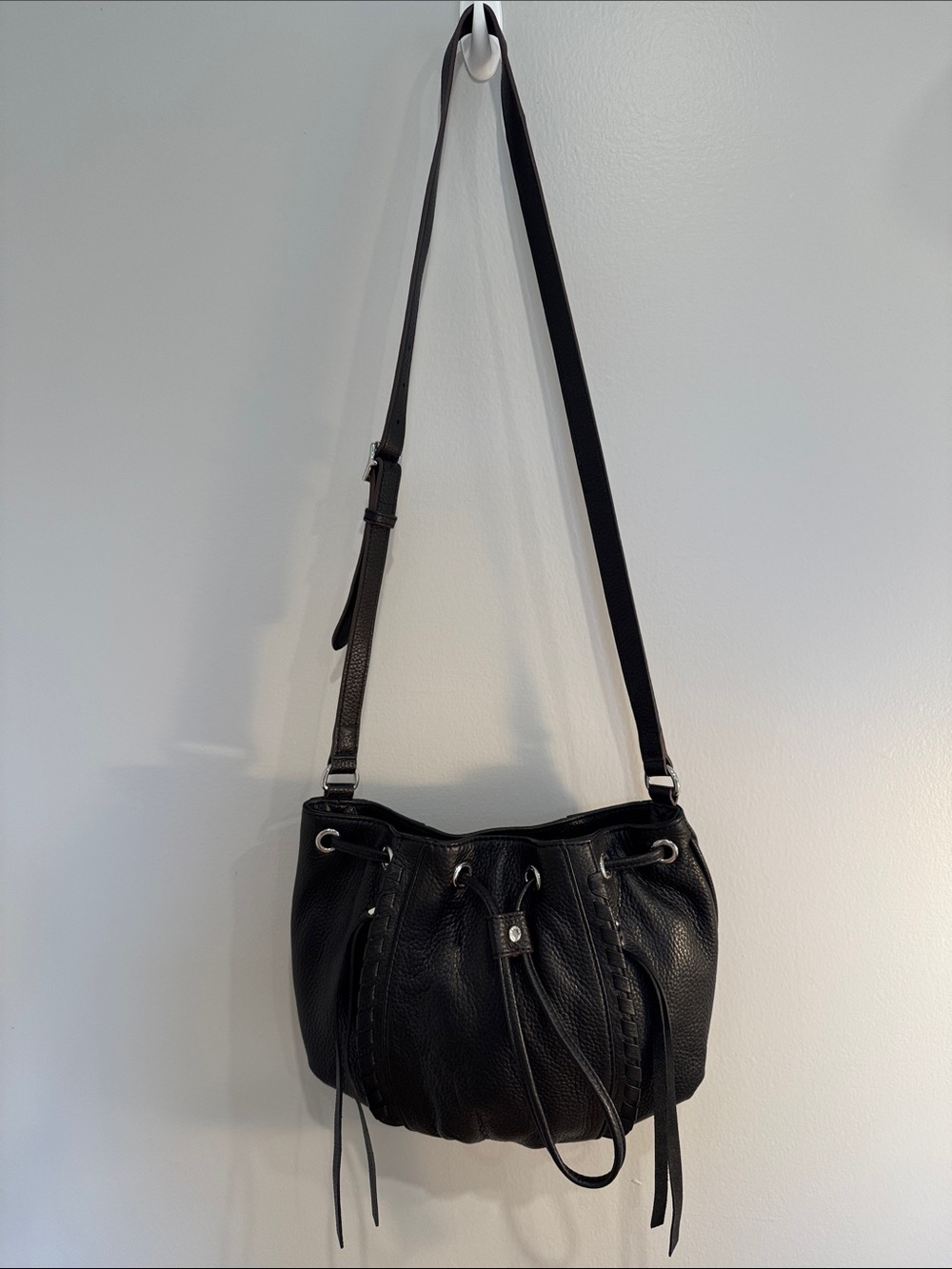 Aimee Kestenberg black leather drawstring crossbody bag